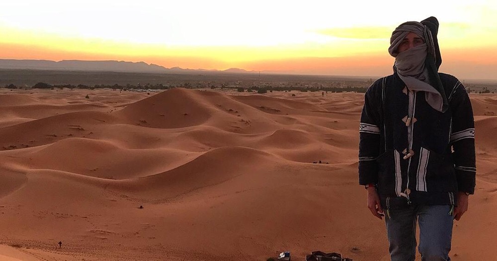Greg Bellwoar in the Sahara desert in Morocco during his semester abroad in Spain