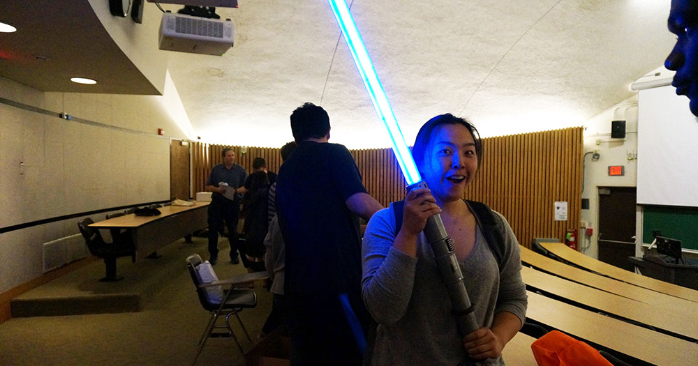 Kayla with a light saber she created in one of her classes