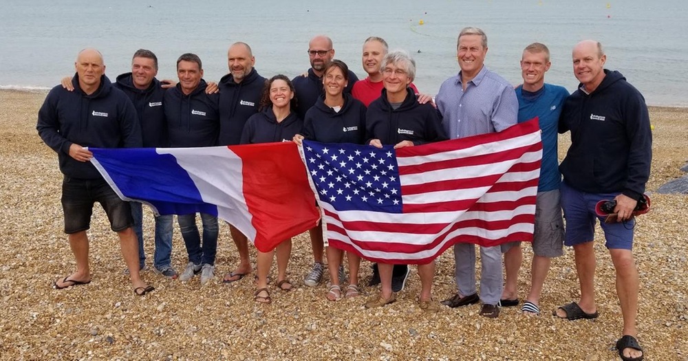 John Stephan (in red) with the other members of Over There! before they left Dover, England, to swim the English Channel Relay