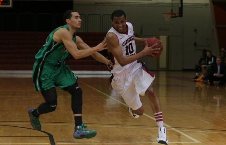 Moore Records First Career Double-Double as Tartans Fall 59-53 at NYU
