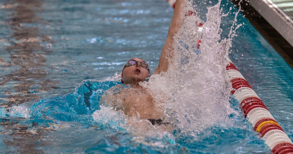 men's swimmer doing backstroke