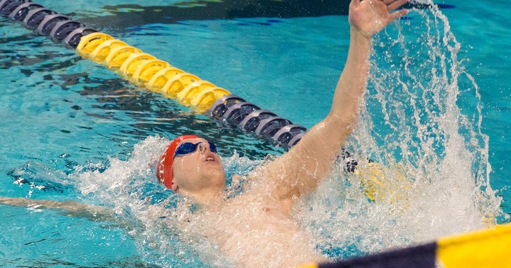 men's swimmer doing backstroke