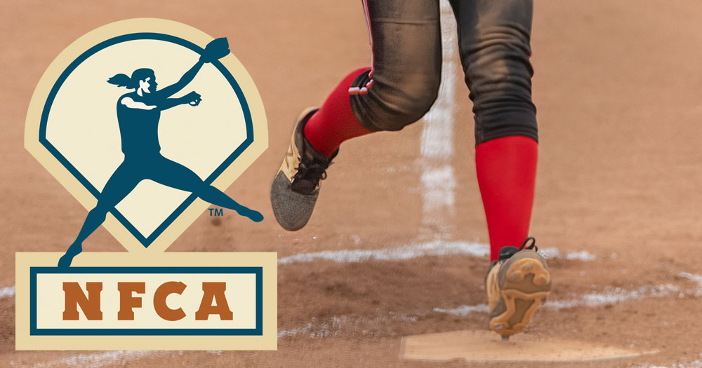 softball player's left football touching home plate to score a run with the NFCA (National Fastpitch Coaches Association) logo to the left of the player's legs