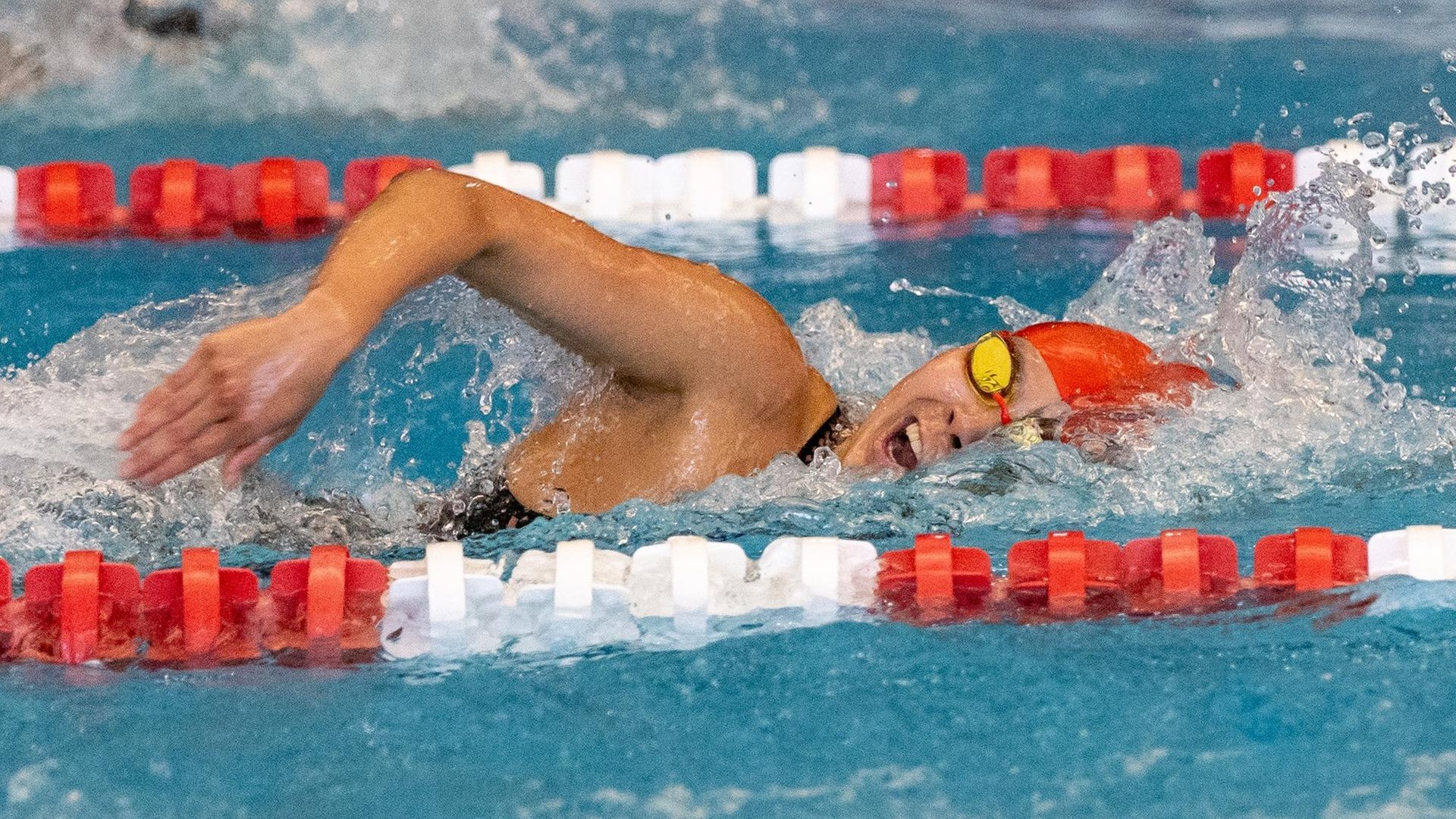 women's swimmer doing freestyle stroke