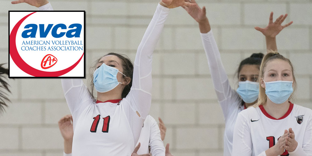 volleyball players wearing face coverings while cheering with raised arms in a blocking pose. AVCA American Volleyball Coaches Association logo with A+ symbol in left corner 